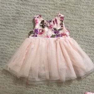 Floral print soft pink Easter style dress.
